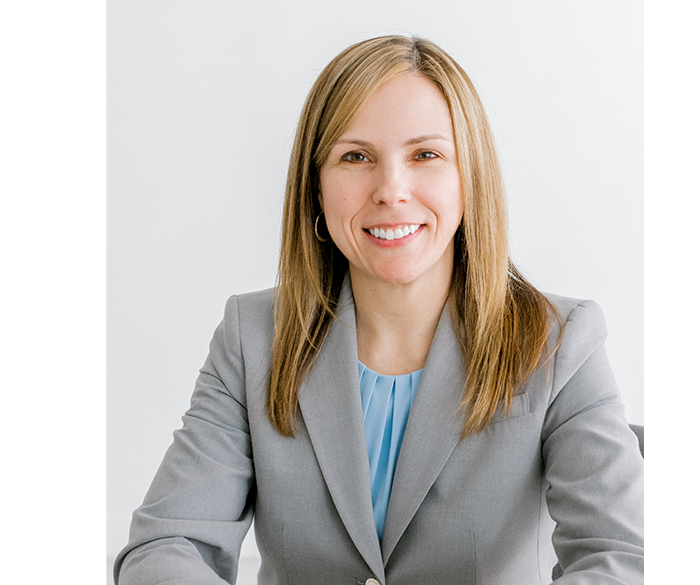 Kelly Dickerson, independent insurance broker, meeting with a client